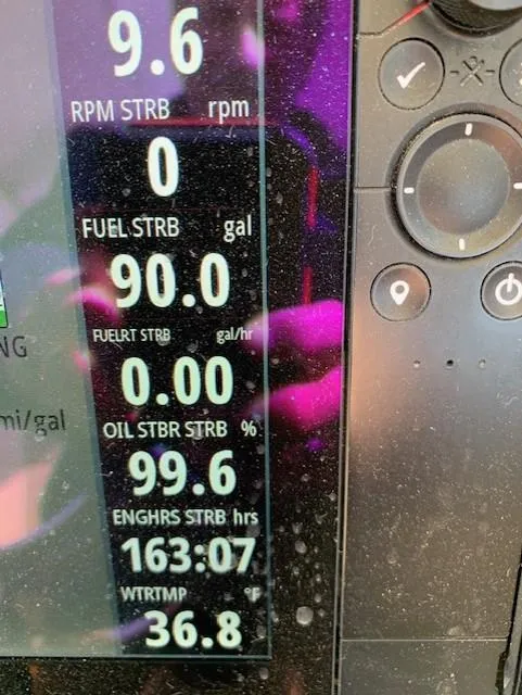 Slide: The Image of Display panel of 2019 Robalo R272 Center Console showing fuel and engine metrics. - 21