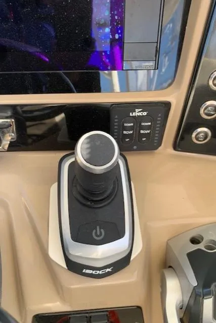 Slide: The Image of 2019 Robalo R272 Center Console joystick control and dashboard interface. - 23
