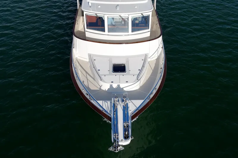 Slide: The Image of Fleming 58 Pilothouse 2018 yacht, aerial view, cruising on calm water. - 10