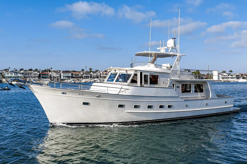 Slide: The Image of 2018 Fleming 58 Pilothouse yacht cruising on a sunny day. - 11