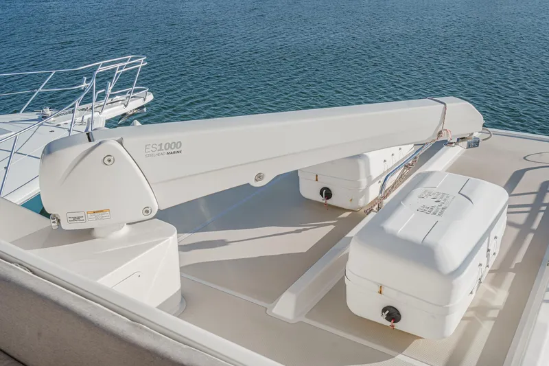 Slide: The Image of 2018 Fleming 58 Pilothouse yacht deck with crane and storage boxes. - 34