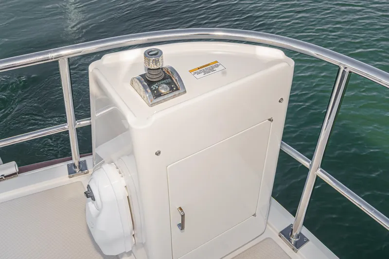 Slide: The Image of Control panel on 2018 Fleming 58 Pilothouse yacht, overlooking water. - 35