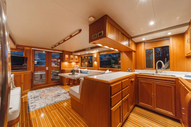 Slide: The Image of Luxurious 2018 Fleming 58 Pilothouse interior with elegant wood finishes and modern amenities. - 45