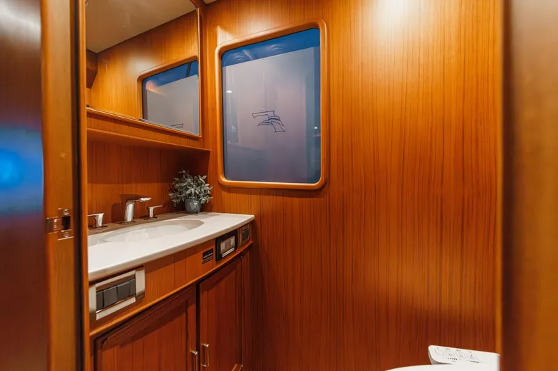 Slide: The Image of Luxurious wooden bathroom interior on 2018 Fleming 58 Pilothouse yacht. - 47