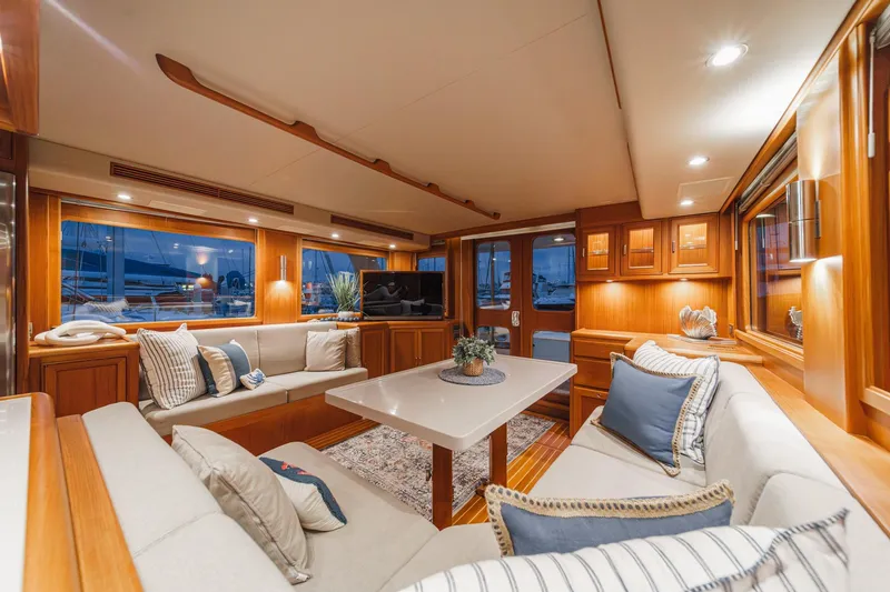 Slide: The Image of Luxurious interior of 2018 Fleming 58 Pilothouse yacht with elegant seating and decor. - 56