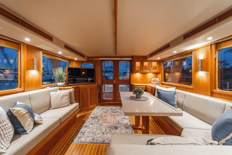 Slide: The Image of Luxurious interior of 2018 Fleming 58 Pilothouse yacht with elegant seating and decor. - 57