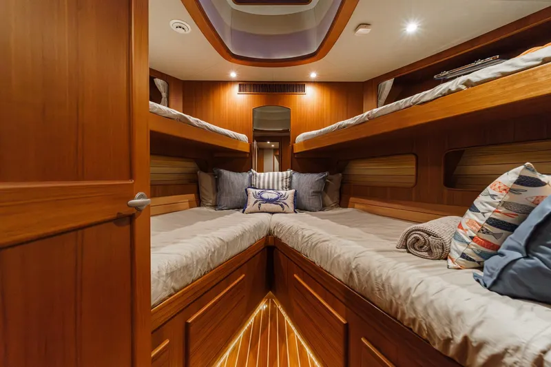 Slide: The Image of Luxurious cabin interior of 2018 Fleming 58 Pilothouse yacht with cozy bedding. - 68