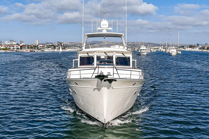 Slide: The Image of Fleming 58 Pilothouse yacht cruising on a sunny day, 2018 model. - 8
