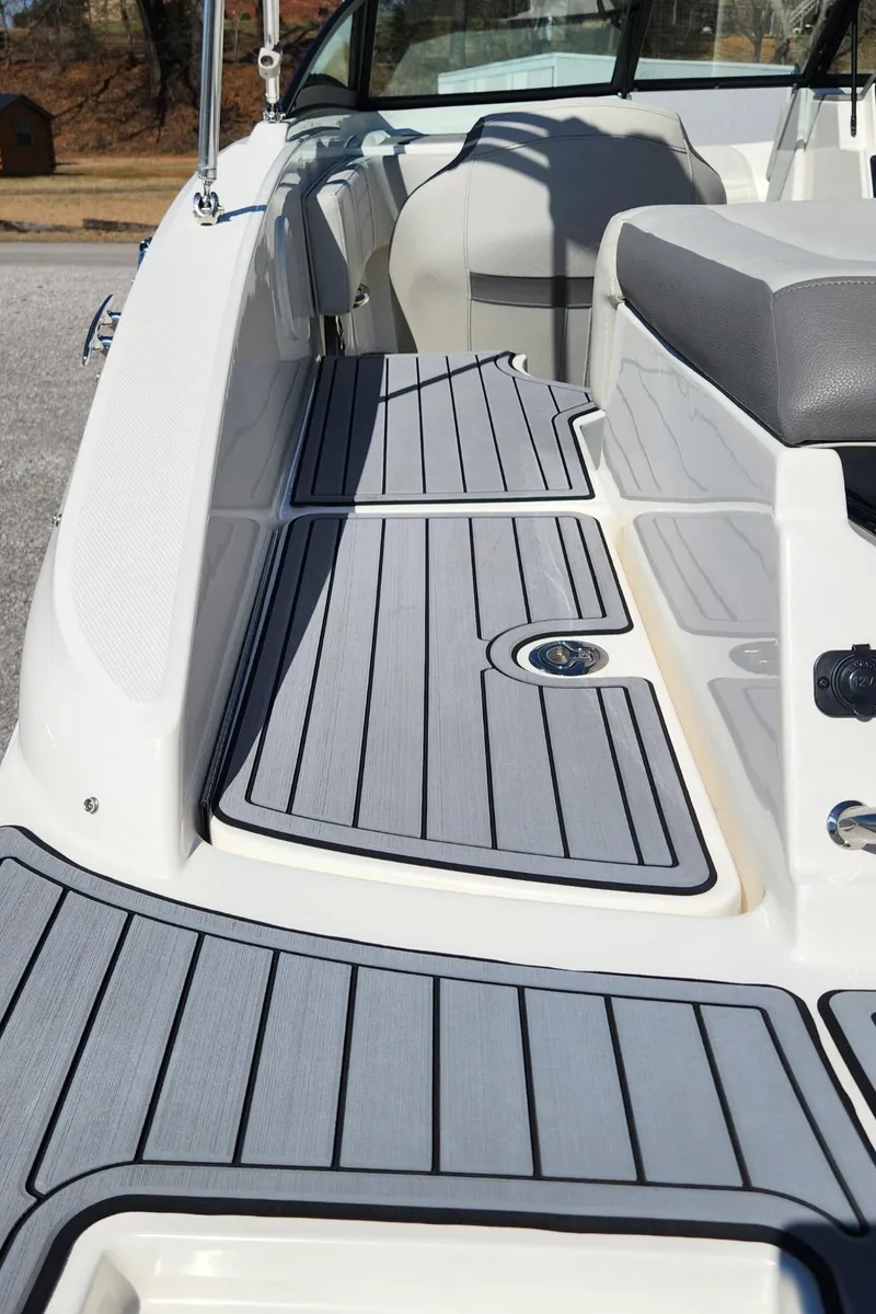 Slide: The Image of 2021 Sea Ray SPX 190 boat interior with sleek gray decking and seating. - 13
