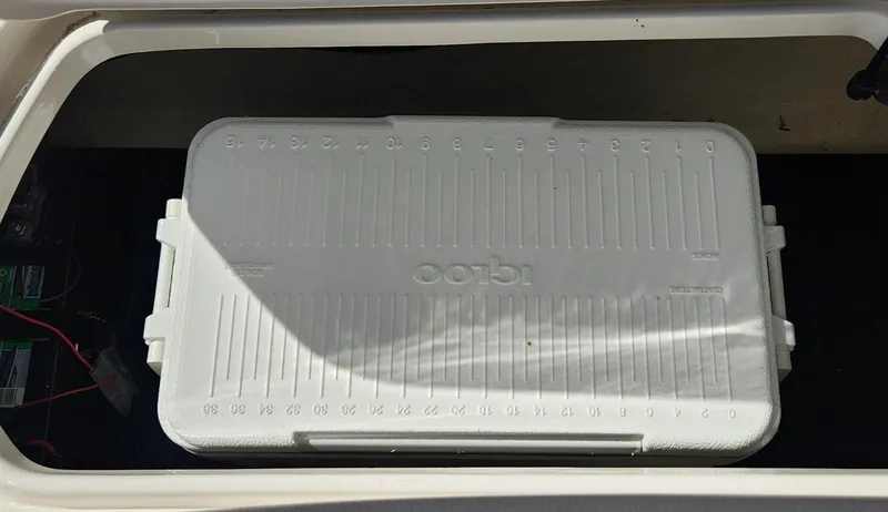 Slide: The Image of White Igloo cooler in Sea Ray SPX 190 boat storage compartment, 2021 model. - 14