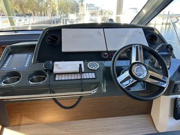 Slide: The Image of 2023 Bavaria R40 Coupe helm with modern controls and sleek steering wheel. - 21