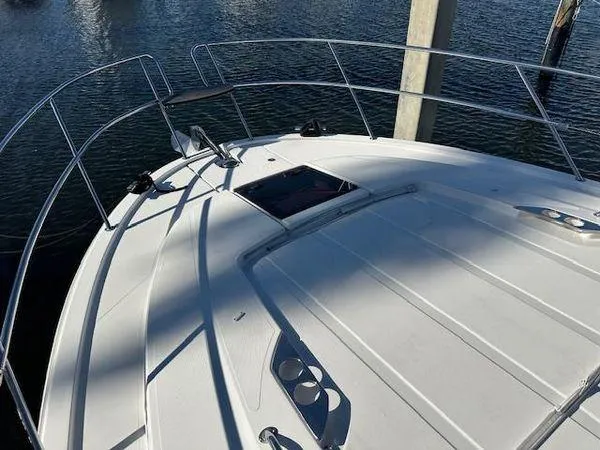 Slide: The Image of 2023 Bavaria R40 Coupe yacht deck with sleek design and water view. - 4