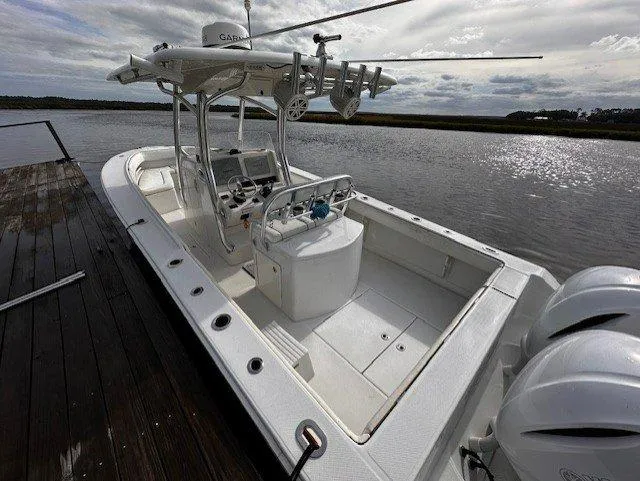 Slide: The Image of 2013 Jupiter 30 FS boat docked by a serene waterfront. - 16