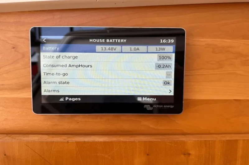 Slide: The Image of Display screen showing battery status on 2001 Silverton 392 Motoryacht. - 56