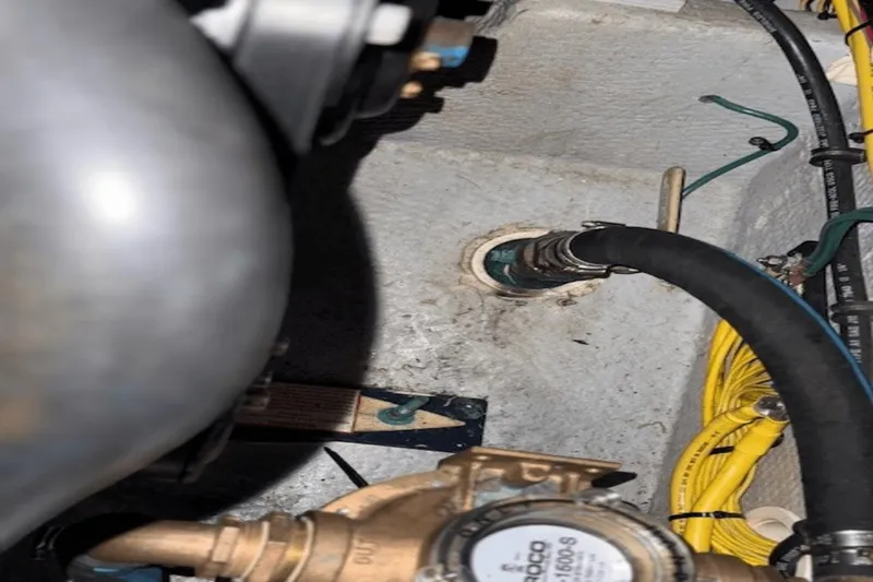 Slide: The Image of Engine compartment of 2001 Silverton 392 Motoryacht with hoses and wiring. - 67