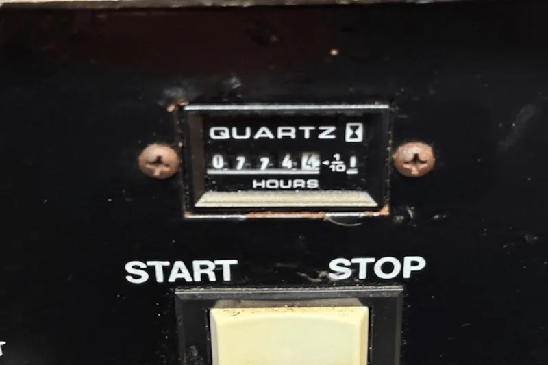 Slide: The Image of Hour meter reading 7744 hours on 2001 Silverton 392 Motoryacht control panel. - 68