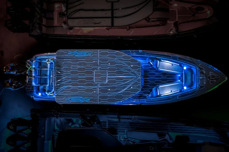Slide: The Image of 2025 Glasstream 32 LS GSX boat with blue LED lights, top view. - 11