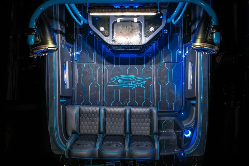 Slide: The Image of 2025 Glasstream 32 LS GSX boat interior with blue LED lighting and seating. - 12