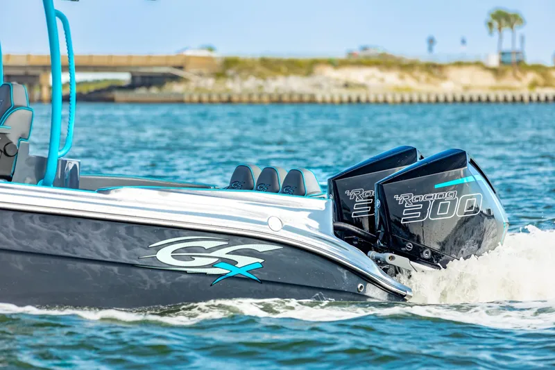 Slide: The Image of 2025 Glasstream 32 LS GSX boat with twin outboard motors on water. - 8