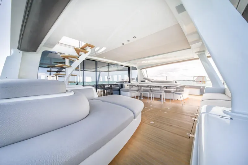 Slide: The Image of Luxurious 2020 Lagoon SEVENTY 7 yacht interior with elegant seating and dining area. - 22