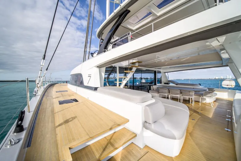 Slide: The Image of Luxurious 2020 Lagoon SEVENTY 7 yacht with spacious deck and modern seating area. - 26