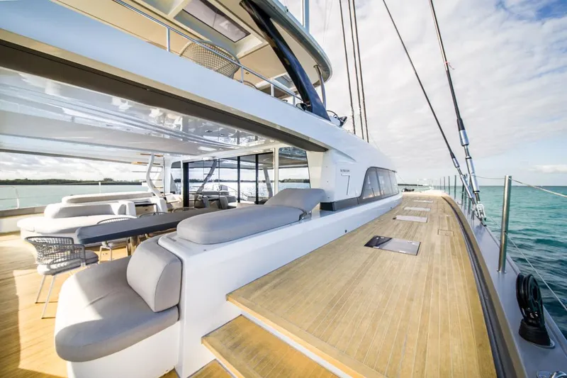 Slide: The Image of Luxurious 2020 Lagoon SEVENTY 7 yacht deck with elegant seating and ocean view. - 27