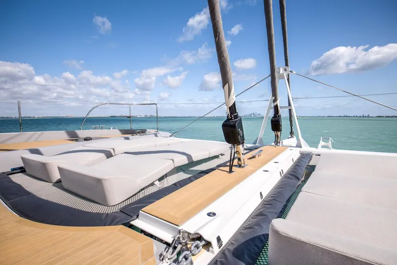 Slide: The Image of Luxurious 2020 Lagoon SEVENTY 7 yacht deck with sun loungers and ocean view. - 34