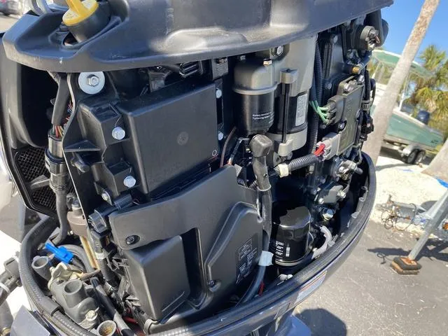 Slide: The Image of Close-up of a 2012 Pioneer 197 Venture boat engine components. - 24