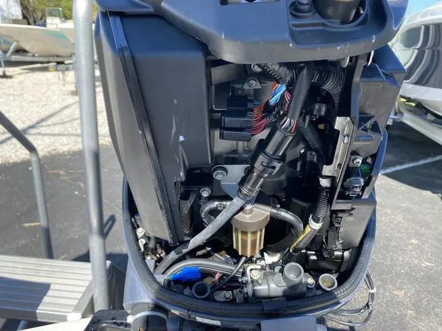 Slide: The Image of Close-up of a 2012 Pioneer 197 Venture boat engine components. - 25