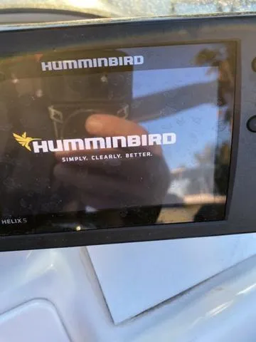 Slide: The Image of Humminbird Helix 5 fish finder on a 2012 Pioneer 197 Venture boat. - 31