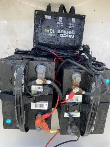 Slide: The Image of NOCO Genius 10X2 charger with dual batteries in a 2012 Pioneer 197 Venture boat. - 8