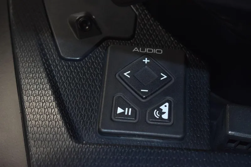 Slide: The Image of 2023 Yamaha WaveRunner FX SVHO audio control panel close-up. - 23