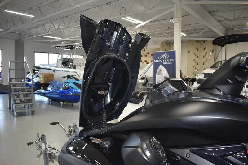 Slide: The Image of 2023 Yamaha WaveRunner FX SVHO® with Audio System in showroom, open storage compartment. - 28