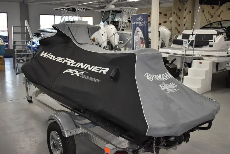 Slide: The Image of 2023 Yamaha WaveRunner FX SVHO with Audio System, covered, on trailer in showroom. - 44