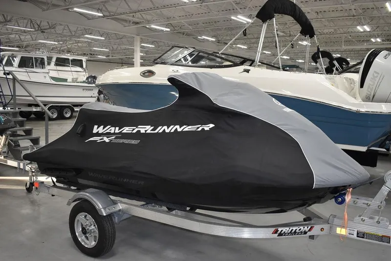 Slide: The Image of 2023 Yamaha WaveRunner FX SVHO® with Audio System, covered, on trailer in showroom. - 46