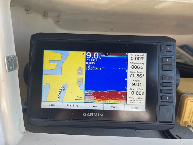 Slide: The Image of Garmin GPS display on 2001 Grady-White Gulfstream 232 boat, showing navigation and depth data. - 14