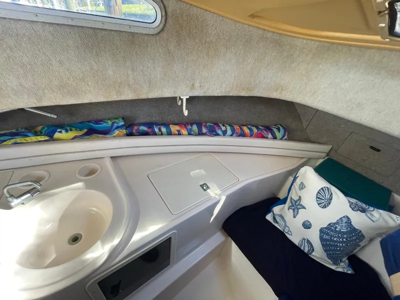 Slide: The Image of Interior cabin of 2001 Grady-White Gulfstream 232 with sink and cushions. - 16