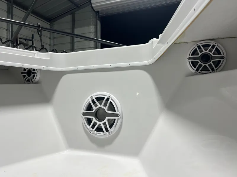 Slide: The Image of 2003 Yellowfin 36 Offshore boat interior with installed speakers. - 26