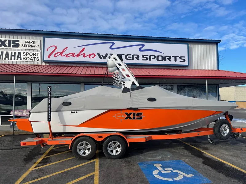 Slide: The Image of 2016 Axis Boats A22 on trailer at Idaho Water Sports dealership. - 3