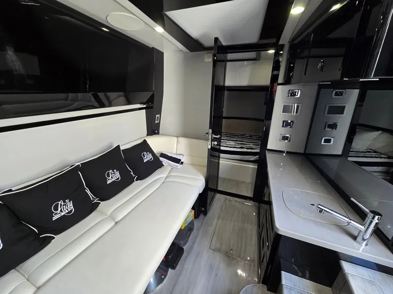 Slide: The Image of Luxurious interior of 2021 HCB 65 Estrella yacht with modern seating and sleek design. - 4