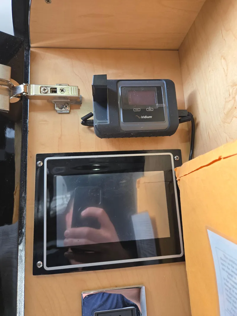 Slide: The Image of Interior of 2021 HCB 65 Estrella with electronic device and reflective screen. - 45