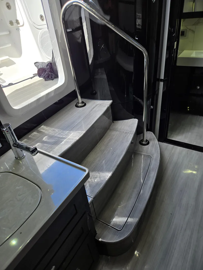 Slide: The Image of Interior stairs of 2021 HCB 65 Estrella yacht with sleek design and modern finishes. - 48