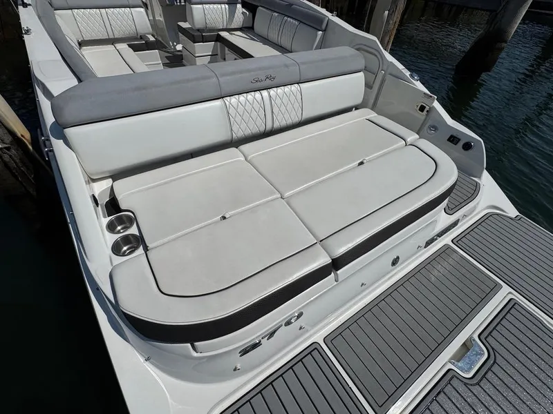 Slide: The Image of 2016 Sea Ray SDX 270 boat with spacious seating and sleek design. - 17
