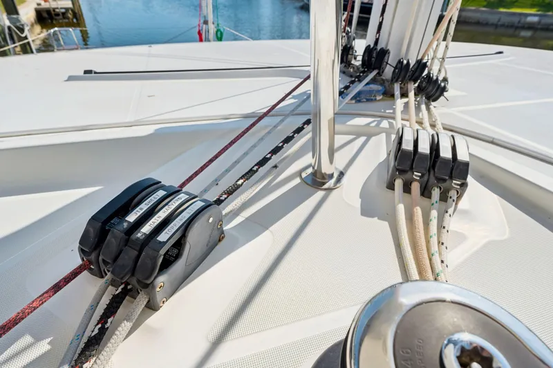 Slide: The Image of Close-up of 2019 Lagoon 42 sailboat deck rigging and winches. - 19
