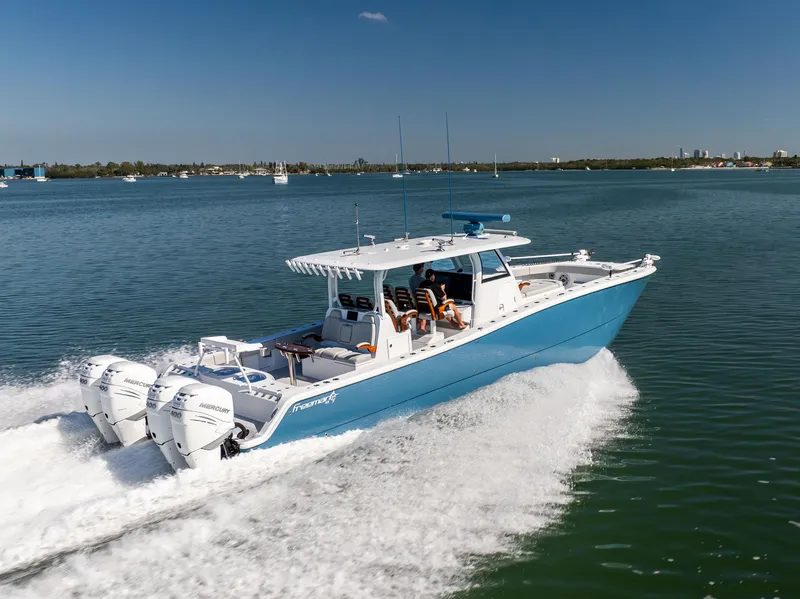Slide: The Image of 2022 Freeman 43 boat cruising on a sunny day in open water. - 12