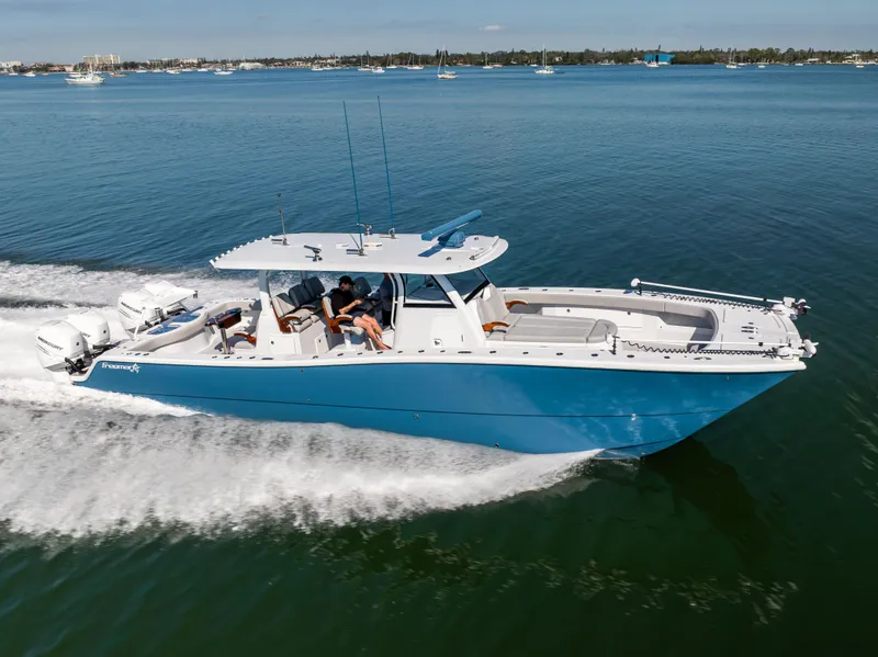 Slide: The Image of 2022 Freeman 43 boat cruising on a calm blue sea. - 14