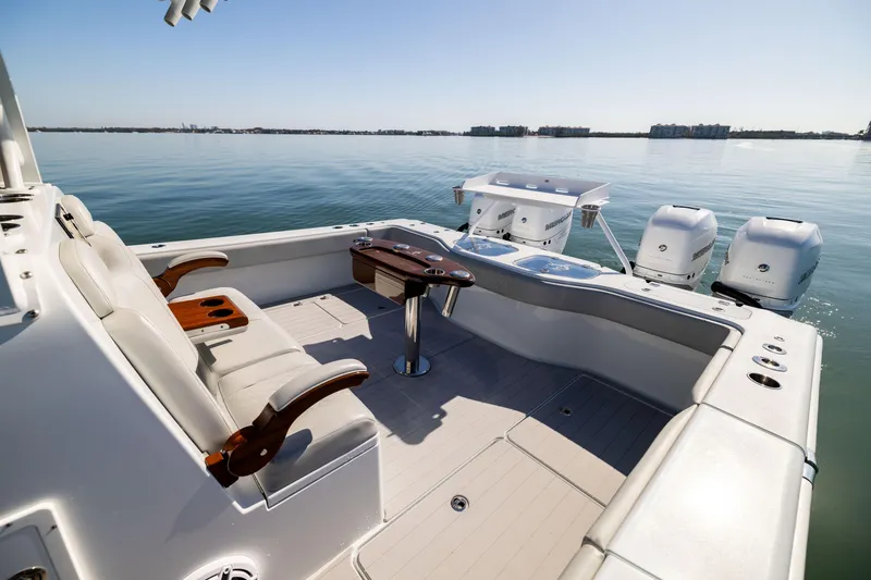 Slide: The Image of Luxurious 2022 Freeman 43 boat interior with seating and ocean view. - 24