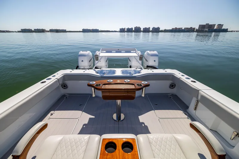 Slide: The Image of Luxury Freeman 43 boat interior, 2022 model, with dual engines and scenic water view. - 25