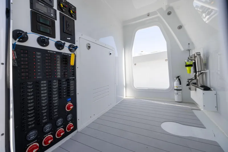 Slide: The Image of Interior of 2022 Freeman 43 boat, featuring control panel and modern design. - 44