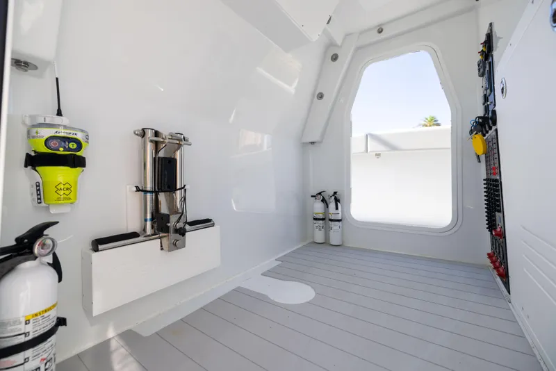 Slide: The Image of Interior of a 2022 Freeman 43 boat, featuring safety equipment and modern design. - 45